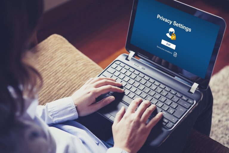 laptop user editing privacy settings