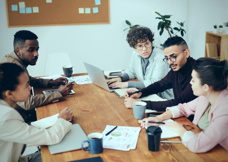 Team of professionals meeting representative of investigations and discussions for class action claims