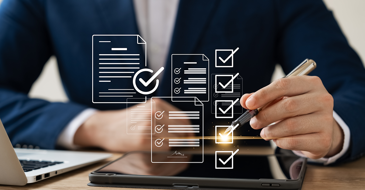 business professional checking documents for compliance