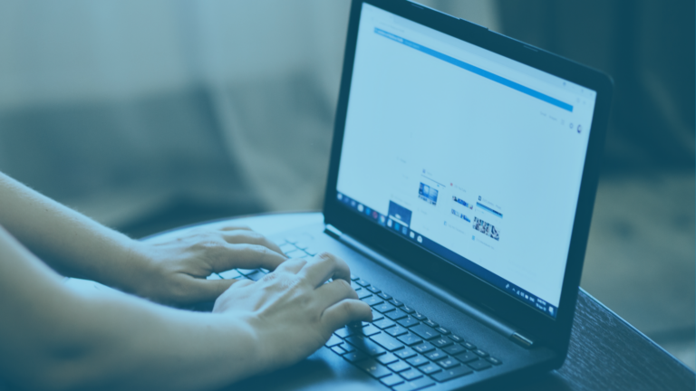 Analyst searching social media platform on a laptop reflective of collecting and authenticating social media evidence.