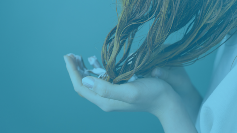 Applying treatment to hair with hands